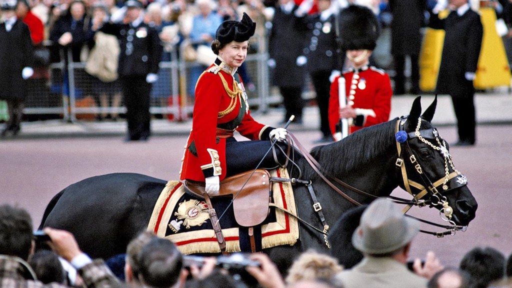 Queen Elizabeth II riding a horse, in ceremonial dress, during the Trooping the Colour ceremony on Horse Guards Parade, London, England, Great Britain, June 1979. The Queen is riding 'Burmese', a gift from the Canadian Royal Mounted Police. (Photo by Tim Graham Photo Library via Getty Images)